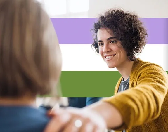 Person reaching out to comfort another