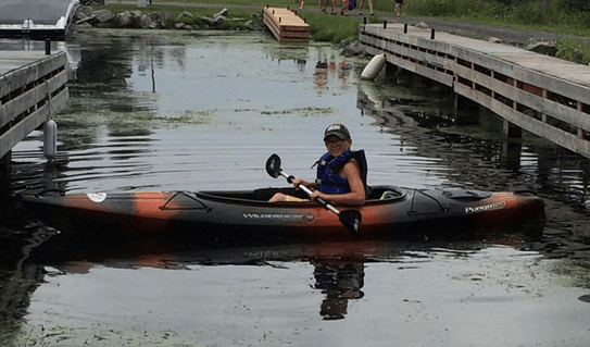 Noah in a kayak