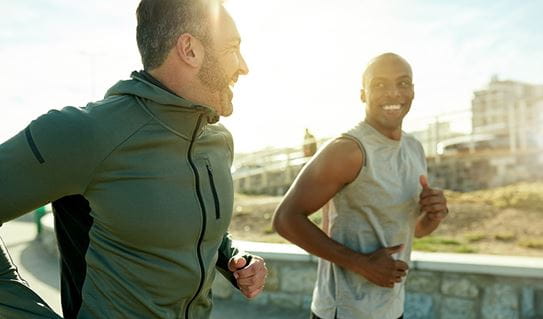 Two men jogging with each other