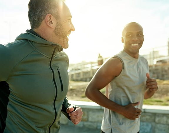 Two men jogging with each other