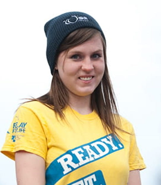 A young woman wearing the survivors T-shirt of Relay
