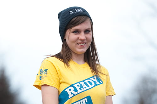 A young woman wearing the survivors T-shirt of Relay