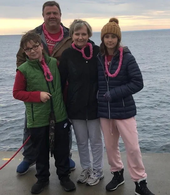 Konstance standing with her family on a pier, 2020 Run for the Cure (virtual). 