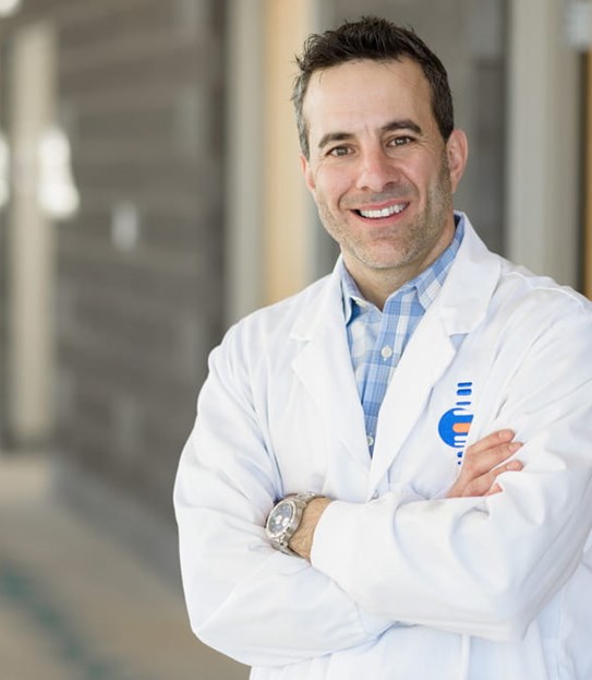 Dr Gilles Robichaud, smiling at the camera.