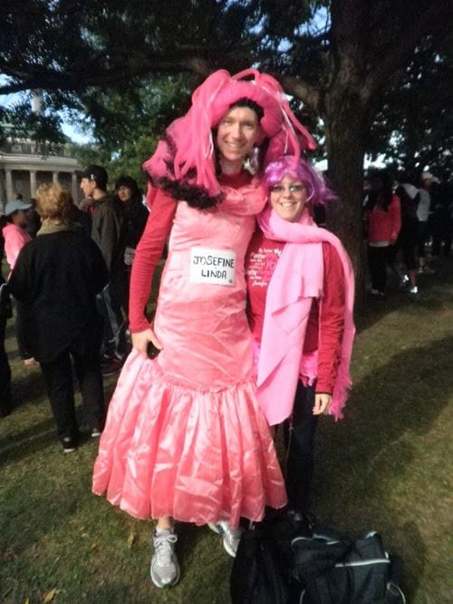 Jeff Timmons wearing a pink dress and large pink wig with another participant before the 2012 CIBC Run for the Cure.