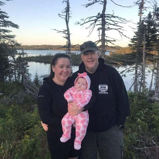 Kent Tarrant with his wife and daughter.
