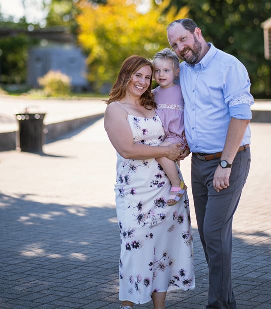 Natalie Lipschultz with her husband and daughter.