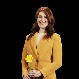 Cancer survivor, Cassidy London, alongside her husband and two children. Cassidy is holding a daffodil, symbolizing hope.