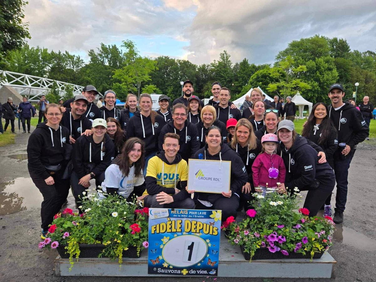 Anthony Vallée surrounded by his Relay For Life team. 