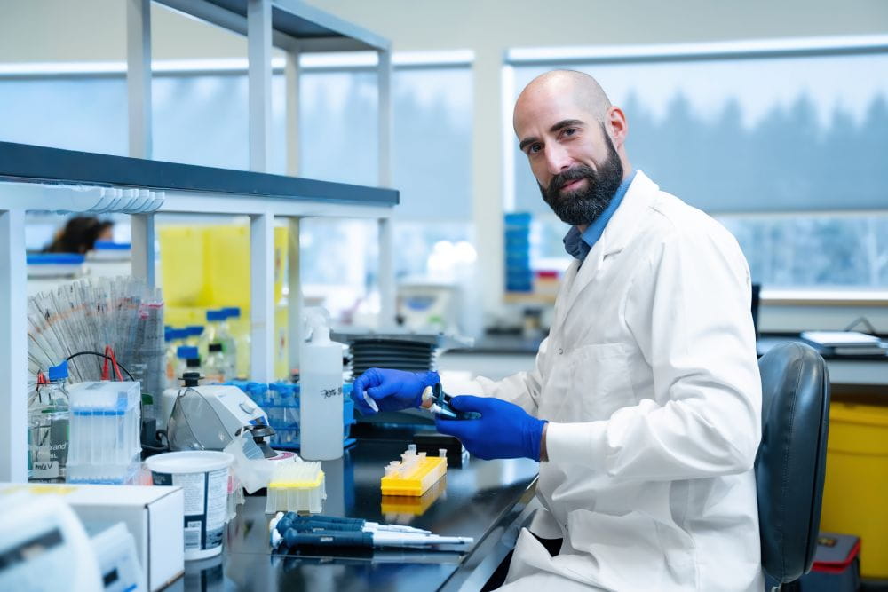 Dr Mathieu Quesnel-Vallières working in a lab.