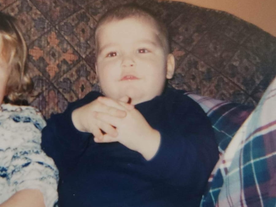 A photograph of James Reid as a baby.