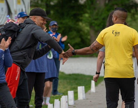 People interacting at a Relay For Life event