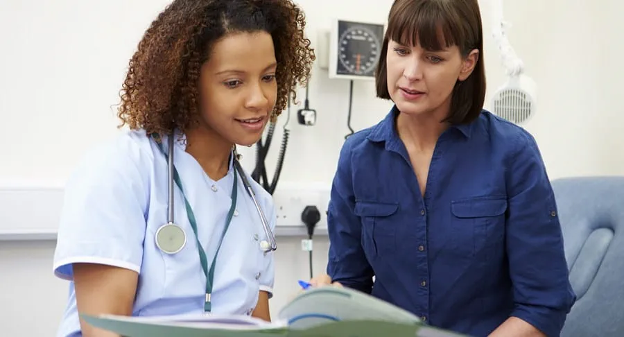 Doctor reviewing test results with a patient