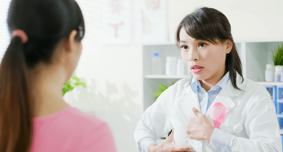 Doctor demonstrating a breast exam