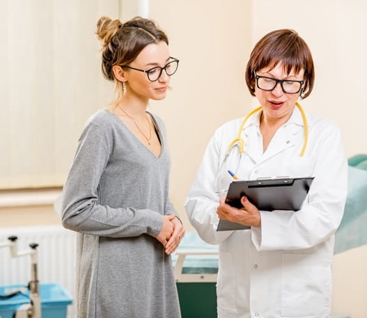 Patient reviewing test results with their doctor