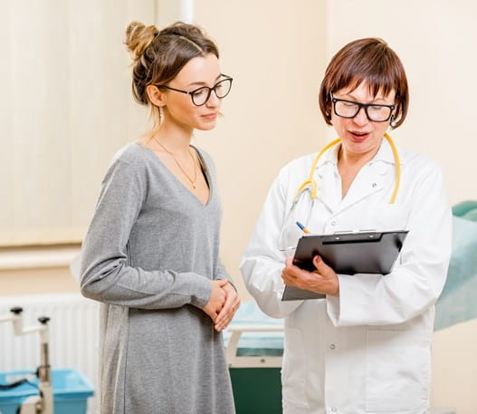 Patient reviewing test results with their doctor