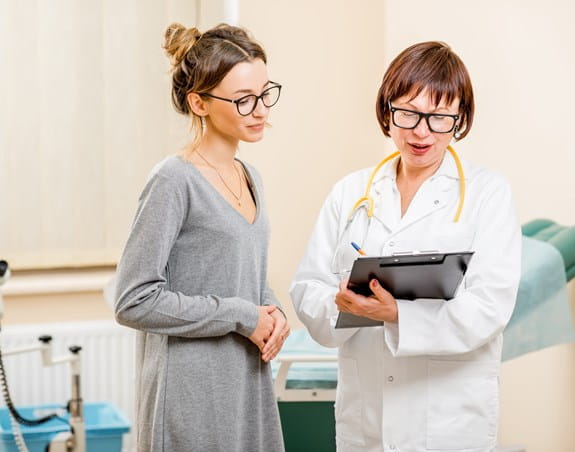 Patient reviewing test results with their doctor