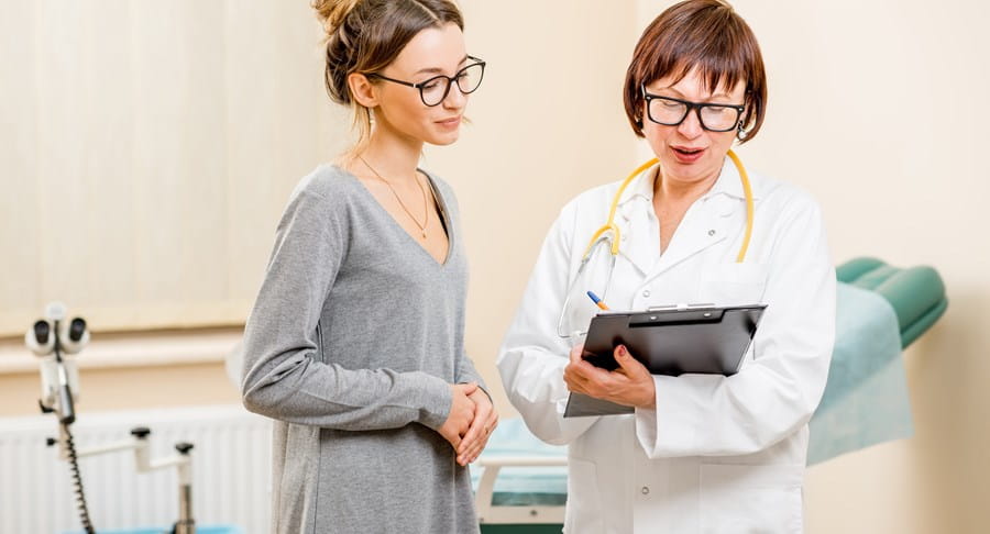 Patient reviewing test results with their doctor