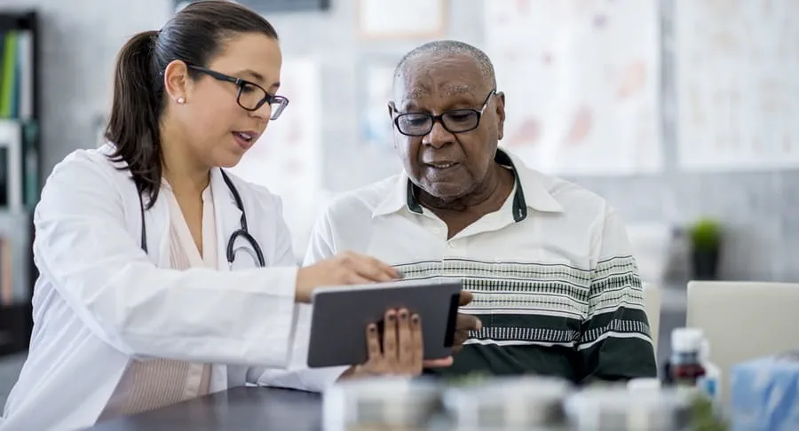 Person looking at test results with their doctor