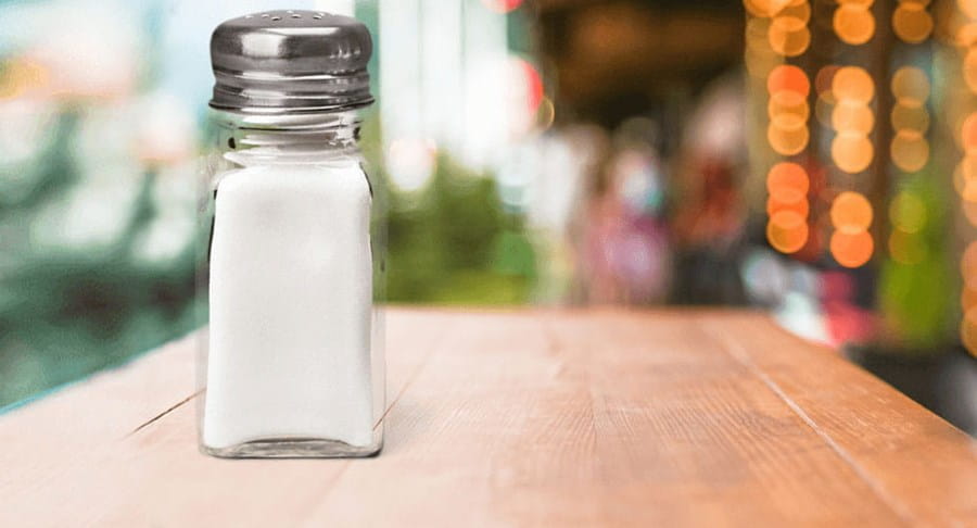 A salt shaker on a table