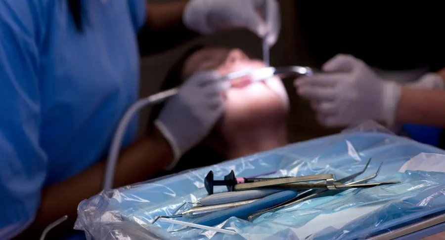 Patient being examined by a dentist