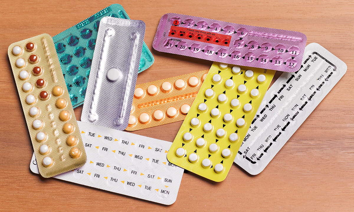 Different kinds of birth control pill packs.