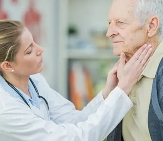 Doctor checking a patients lymph nodes.