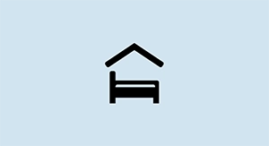 Icon of a bed, with a roof over it.
