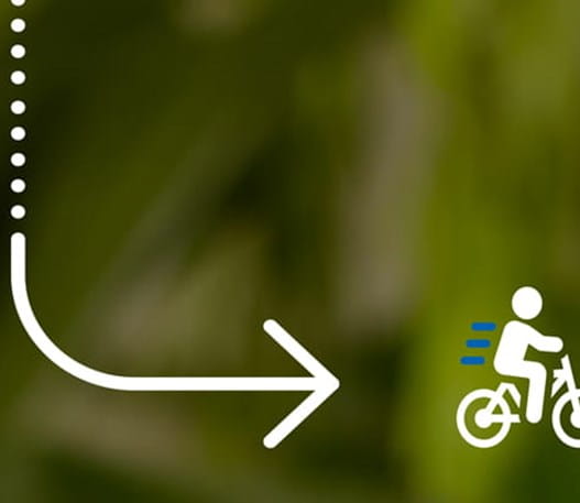 Pictogramme d'une personnage à vélo sur fond vert