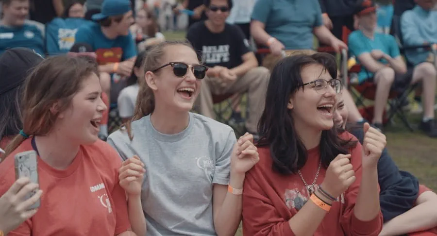 Two young girls laughing at a Relay For Life event.