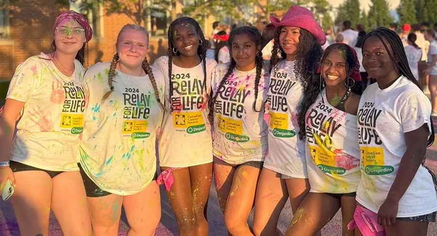 A group of girls wearing Relay For Life t-shirts.
