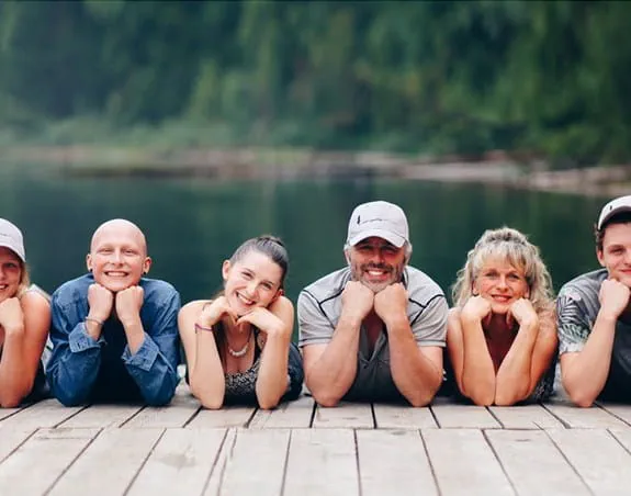 A group of volunteers on a boardwalk