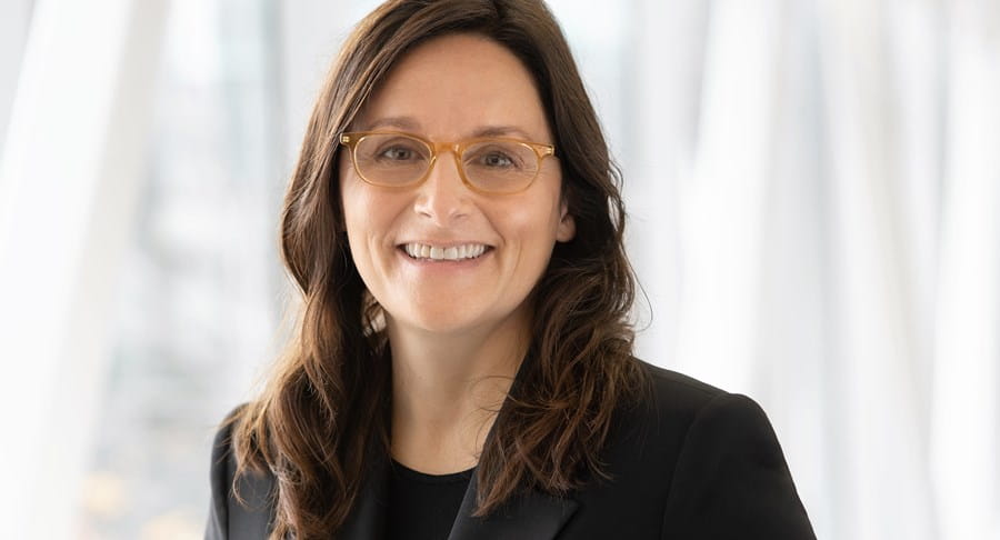 A photo of Dr Cynthia Ménard smiling at the camera