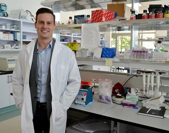 Dr Alexander Wyatt is standing in his lab at the University of British Columbia