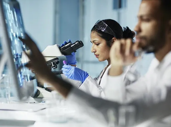 A man and woman in a research lab.