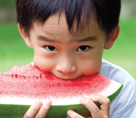 Child eating watermelon