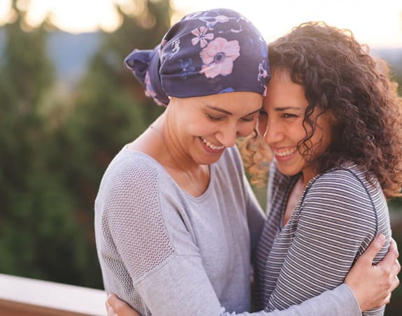 Two women hugging